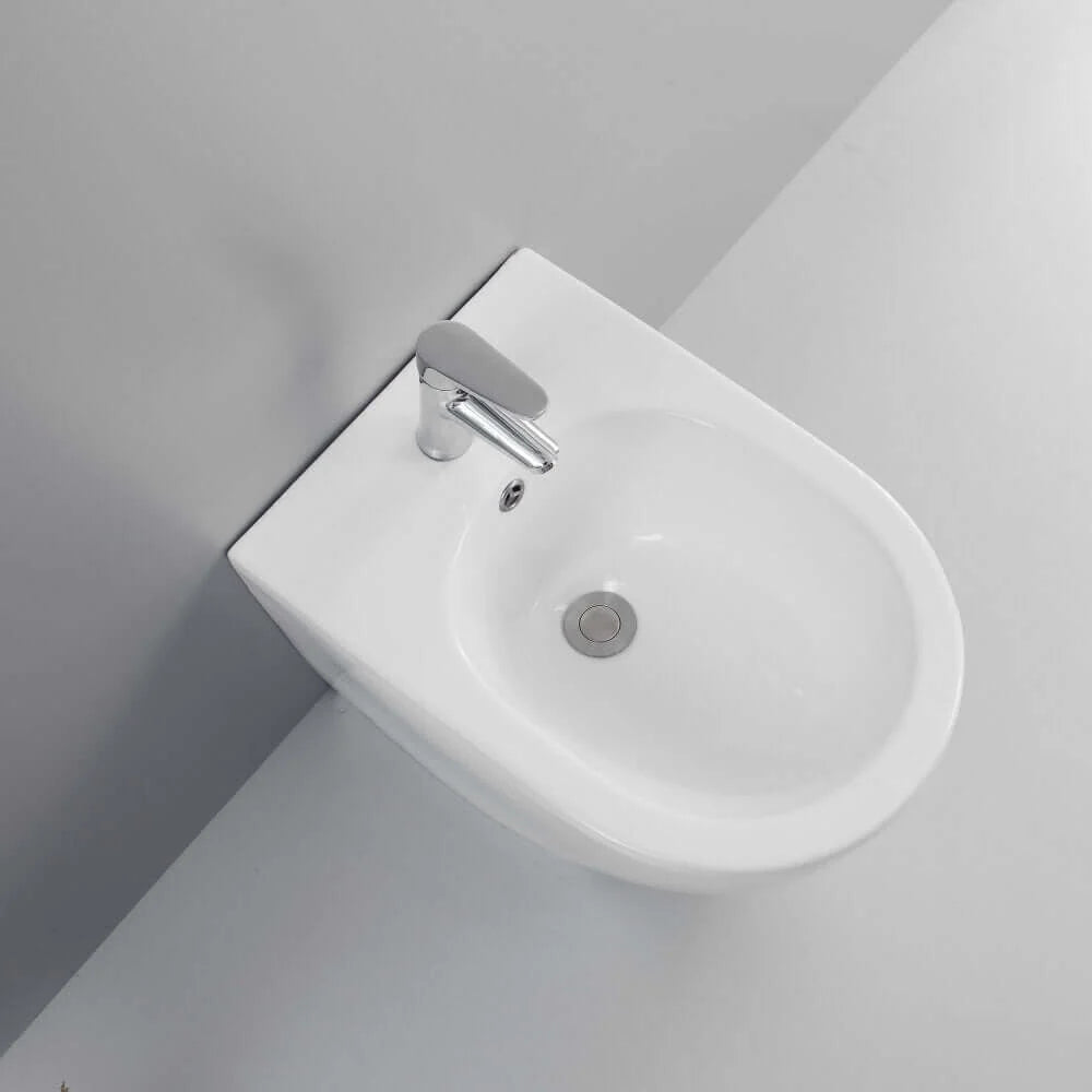 ARIES | Set sanitari a terra filo muro con tecnologia rimless