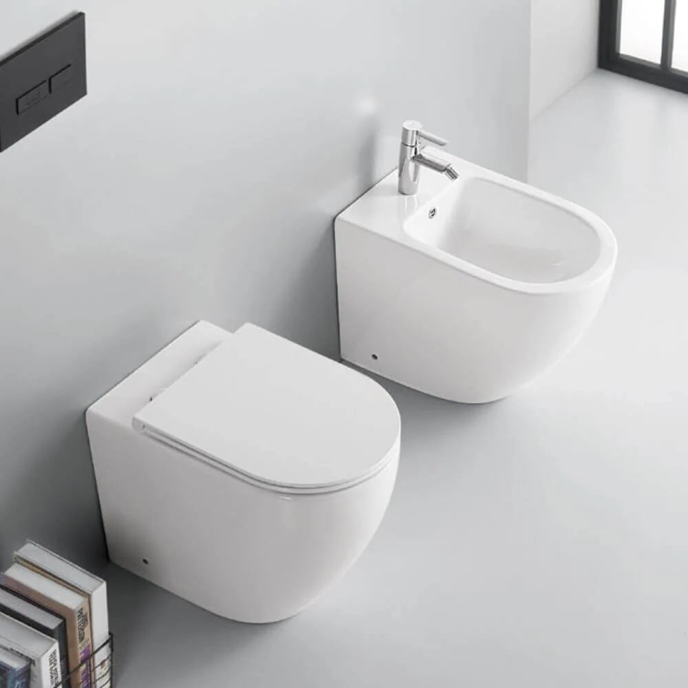 TAURUS | Set sanitari a terra filo muro con scarico Vortex