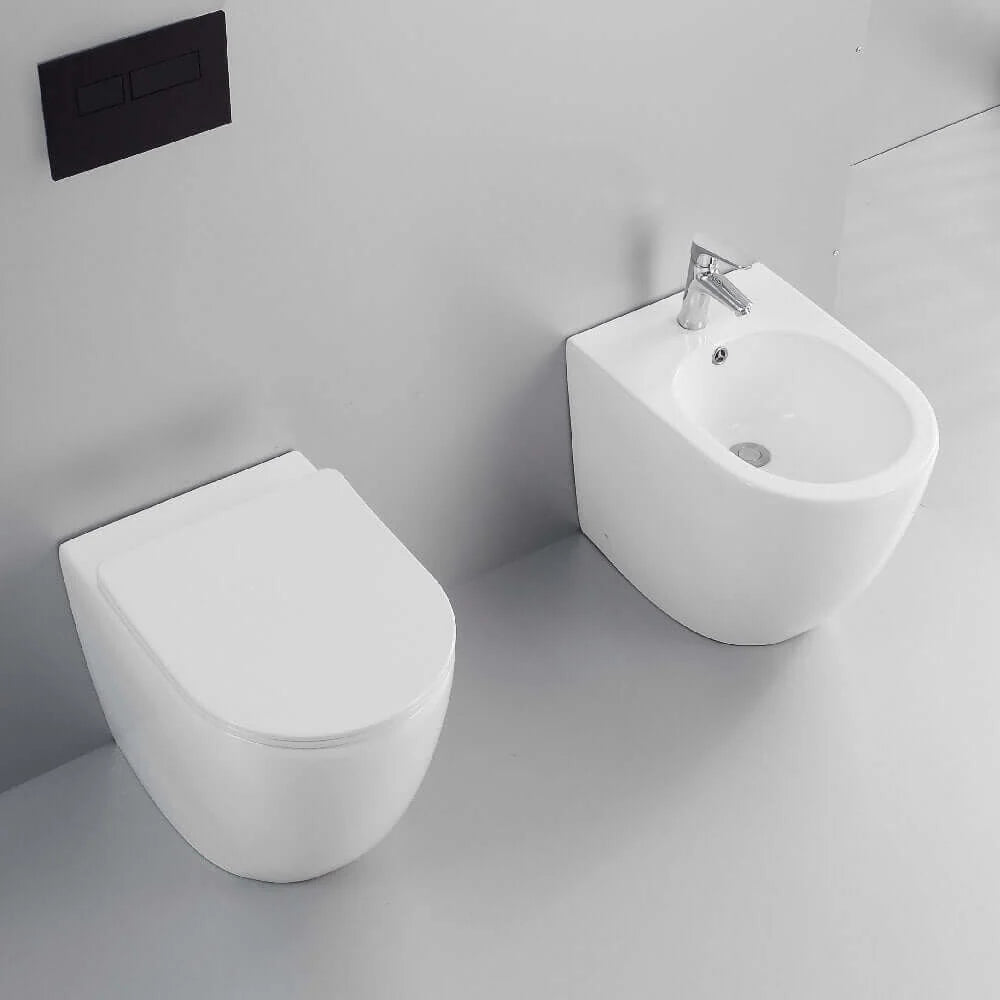 ARIES | Set sanitari a terra filo muro con tecnologia rimless